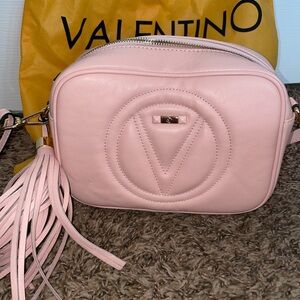 Gently used Valentino crossbody. Pink blush color.